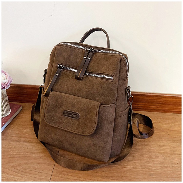 Women's Backpack 2026 New Fashion Korean Style Casual Versatile Color-Blocking Small Backpack Original Niche Cowhide Travel Bag.